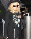Madonna and Her Son At JFK Airport - March 14