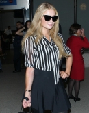 Paris Hilton arrives back at LAX - March 16