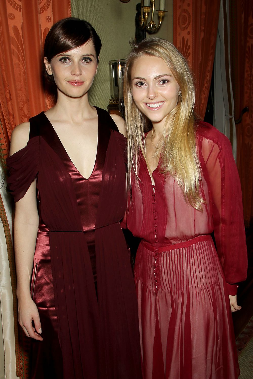 Actors Felicity Jones and AnnaSophia Robb attend "The Theory of Everything" Special Screening - November 18