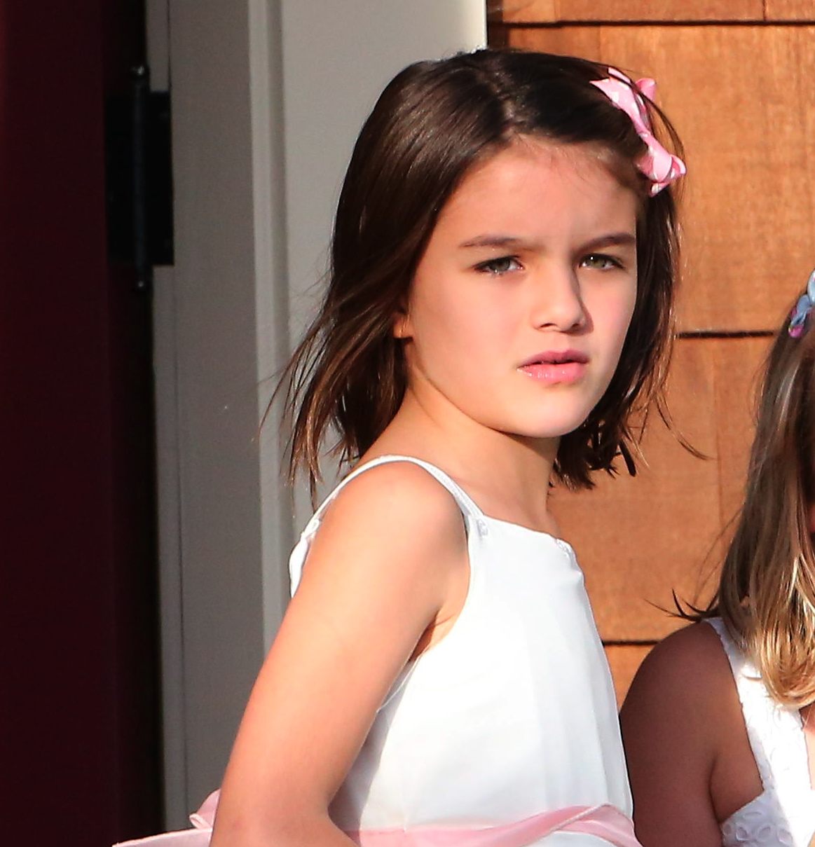 Katie Holmes Takes Suri Cruise To A Birthday Party - November 29