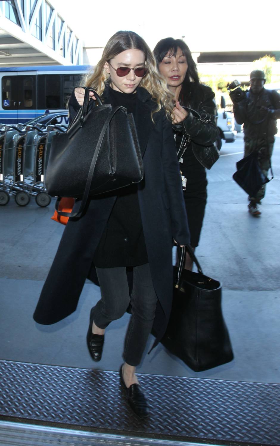 Ashley Olsen is seen at LAX airport, 23 December 2014.