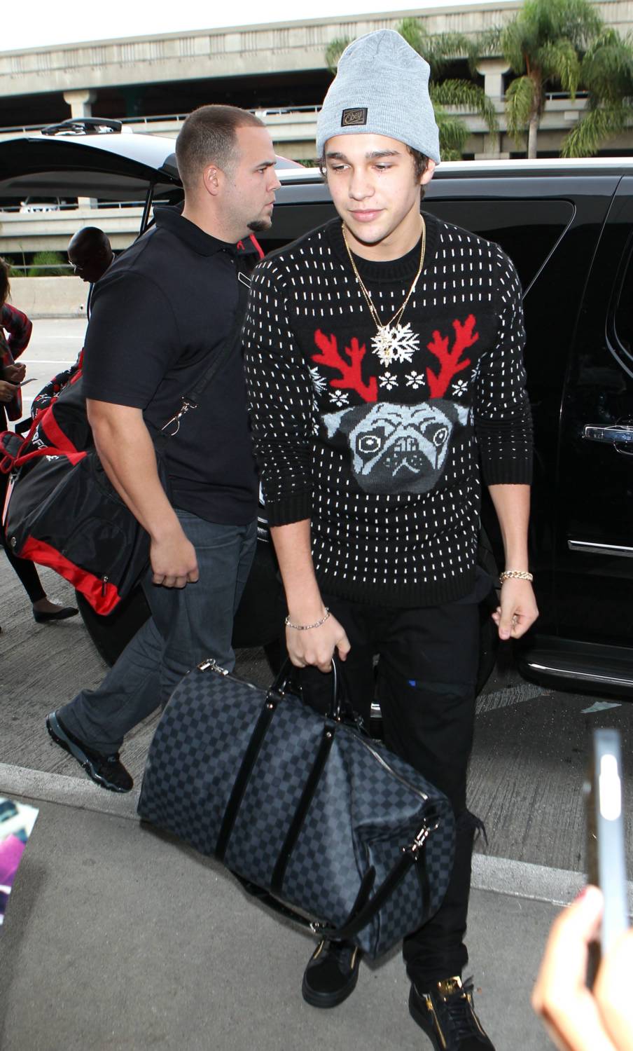 Singer Austin Mahone was spotted at LAX on December 5, 2014