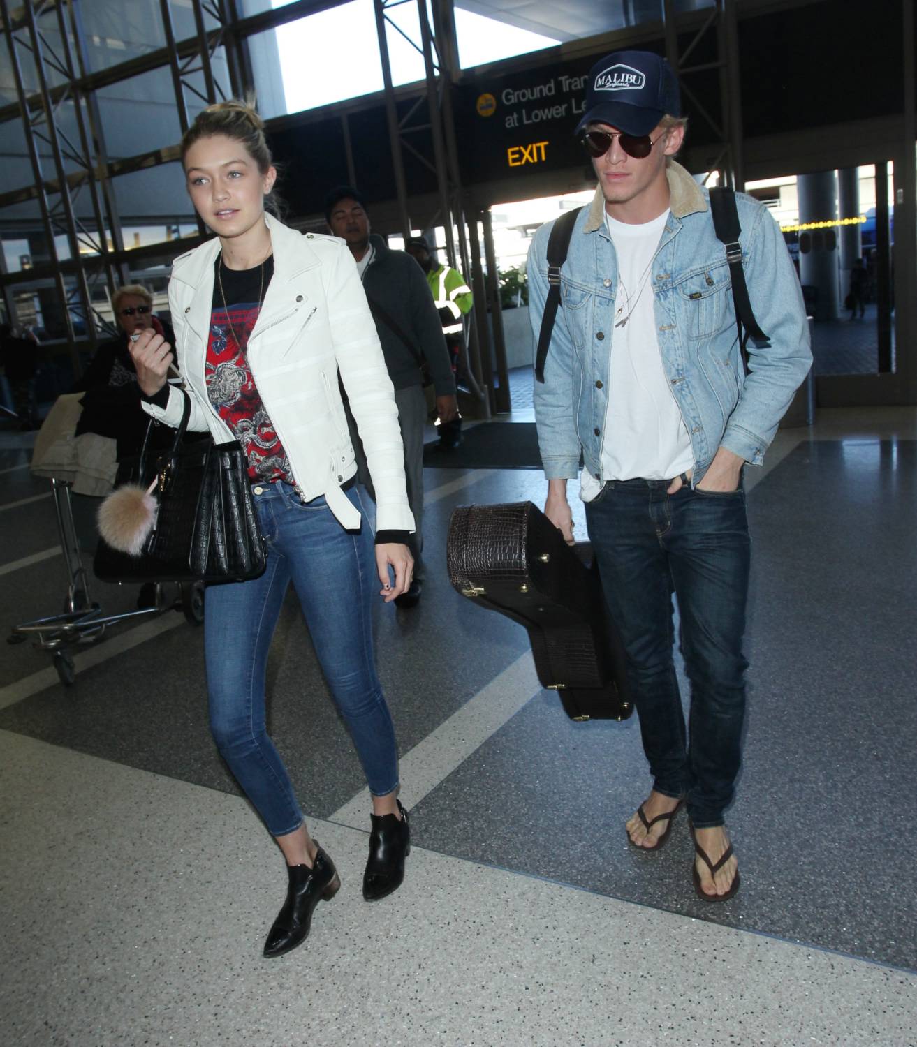 Cody Simpson and girlfriend Gigi Hadid are seen making their way through LAX airport, 27 December 2014.