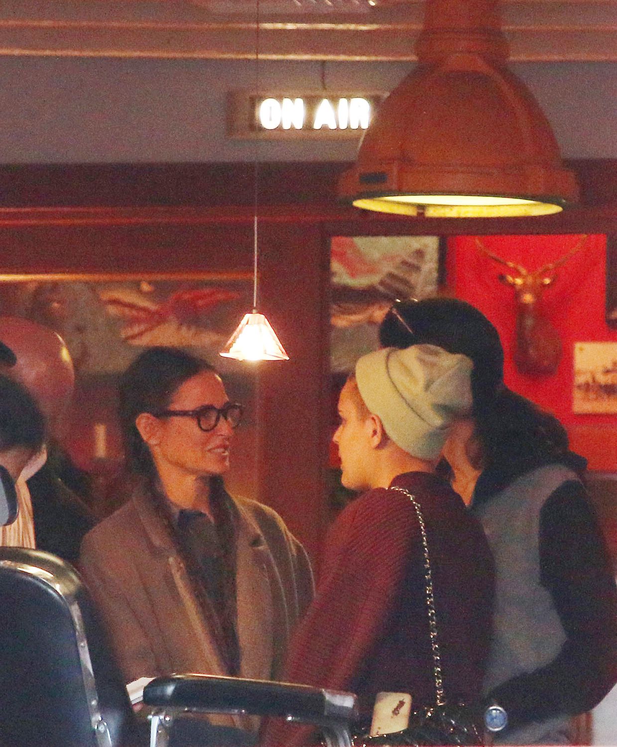 Demi Moore and daughters Rumer Willis and Tallulah Willis visit The World Famous Body Electric Tattoo & Piercing on December 12, 2014.