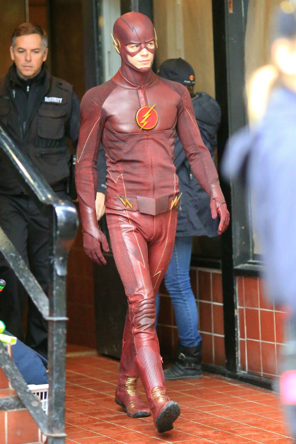 Stars Grant Gustin and Candice Patton film scenes for the hit CW show "The Flash" on December 18, 2014 in Vancouver, Canada.