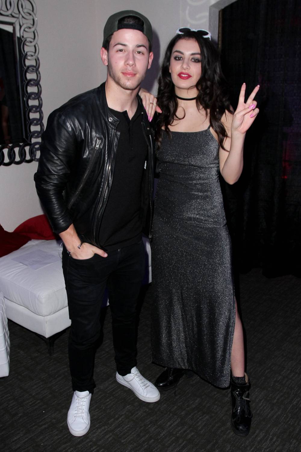 Nick Jonas & Charli XCX attend Y100's Jingle Ball 2014 at BB&T Center on December 21, 2014 in Miami, FL.