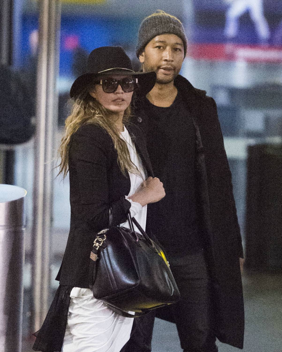 Chrissy Teigen and John Legend arrive at JFK airport in NYC on January 4, 2015.