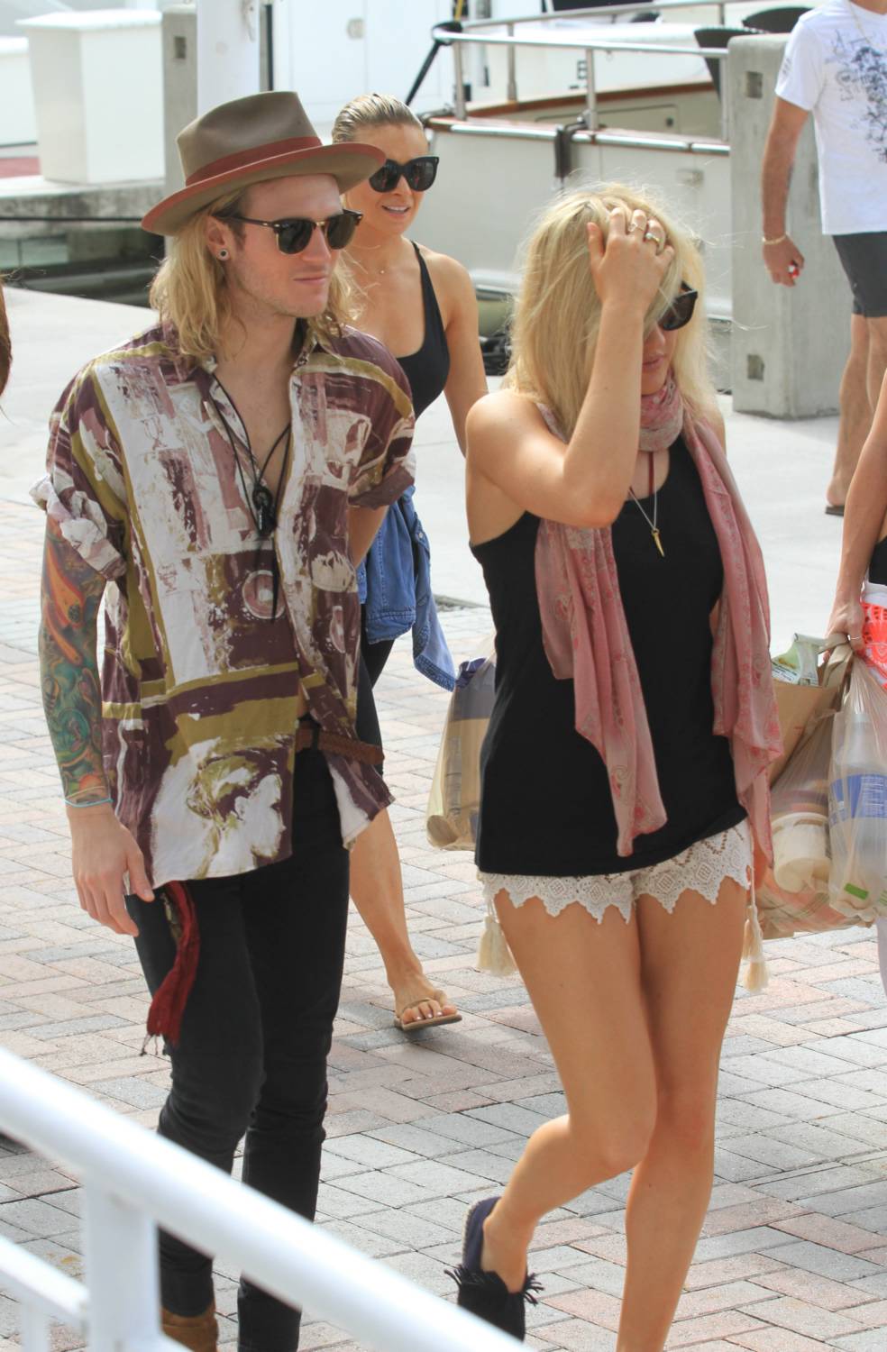 Ellie Goulding and boyfriend Dougie Poynter in Miami take a boat ride and later stroll along Bayside in downtown Miami on January 4, 2015.