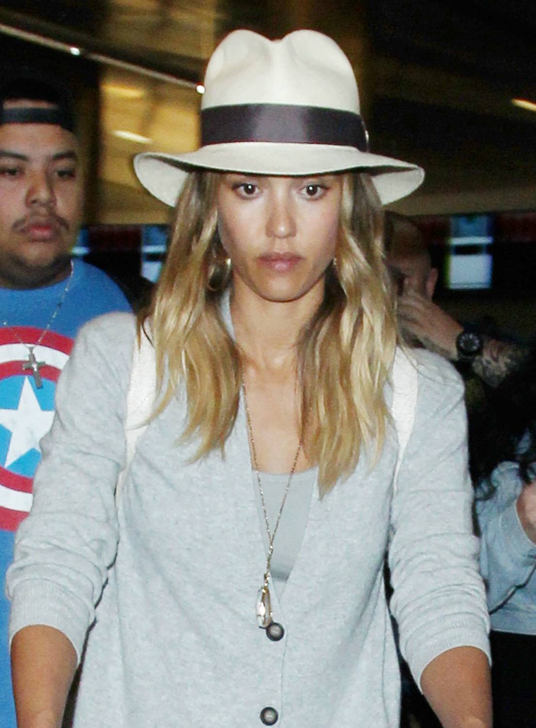 Jessica Alba and family arrive at the Los Angeles International Airport on January 4, 2015.
