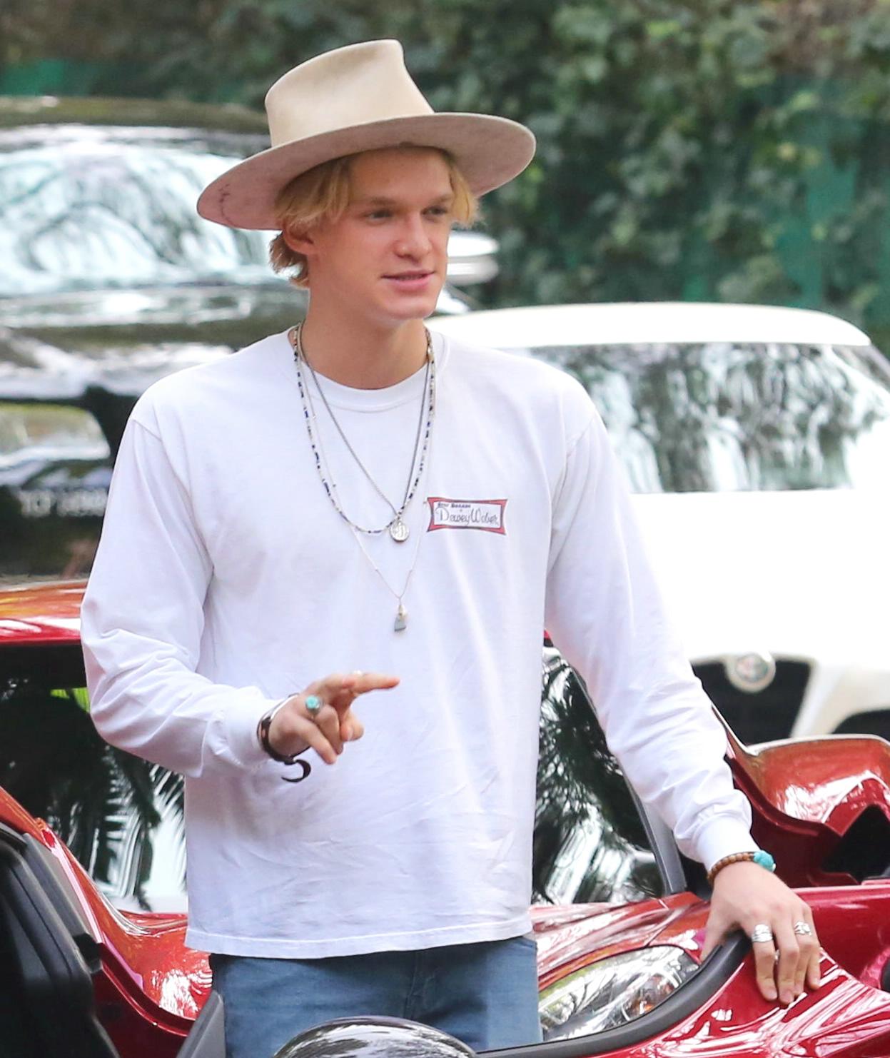 Cody Simpson Drives Candy Red Alfa Romeo 4C - February 20