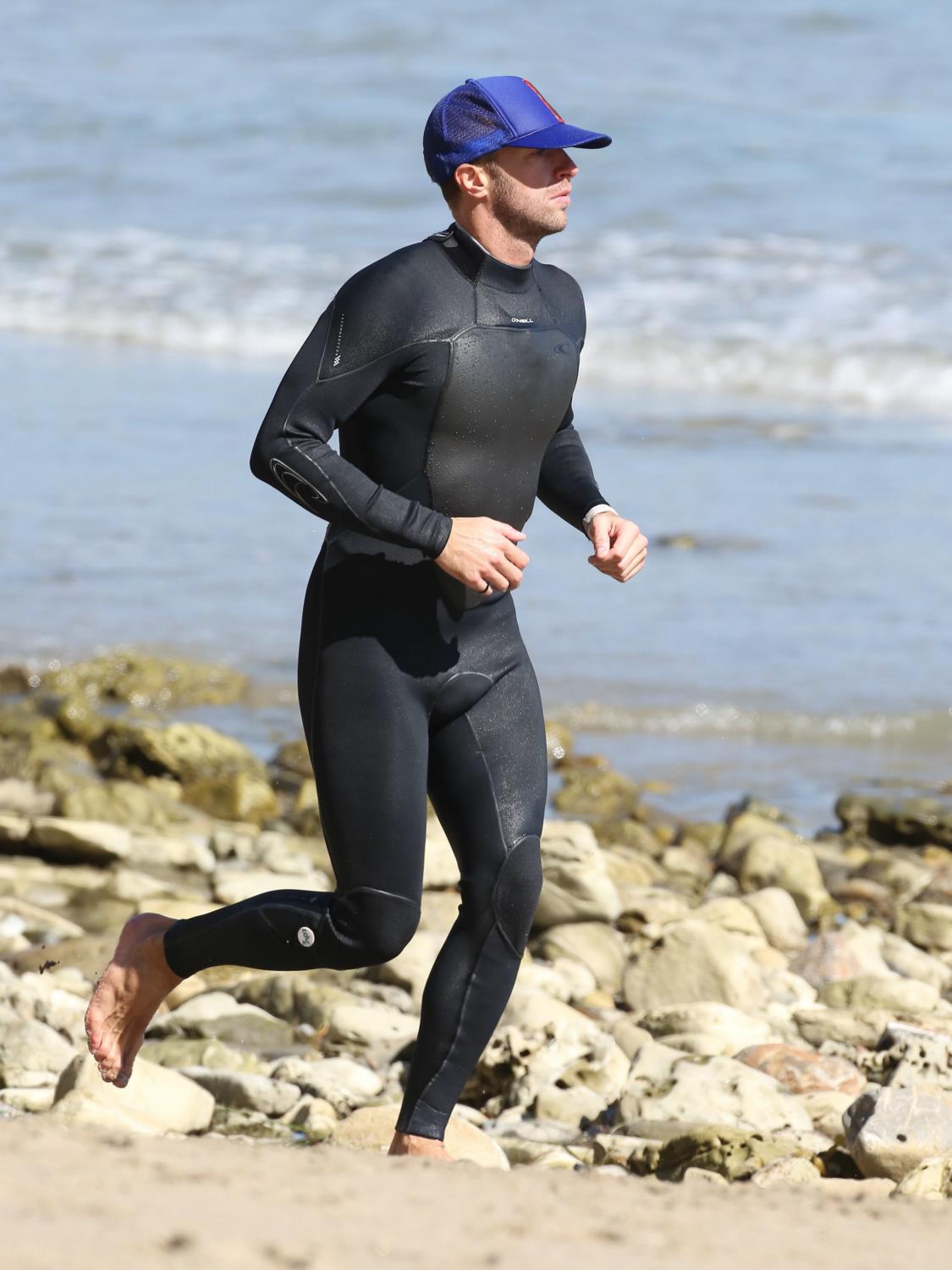 Chris Martin Surfing in Malibu - February 15
