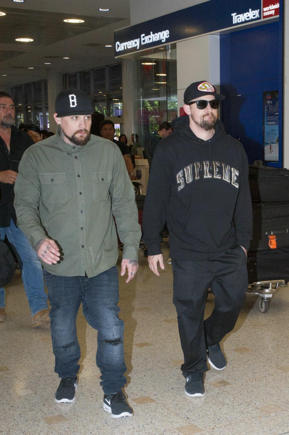 The Madden Brothers Arrive at LAX Airport - Feb 23