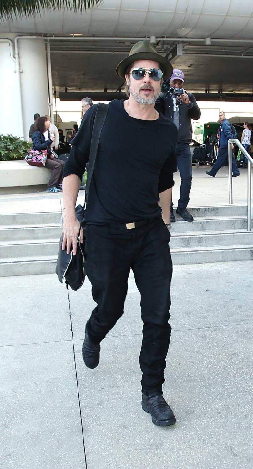 Brad Pitt Arrives at LAX Airport - Feb 28