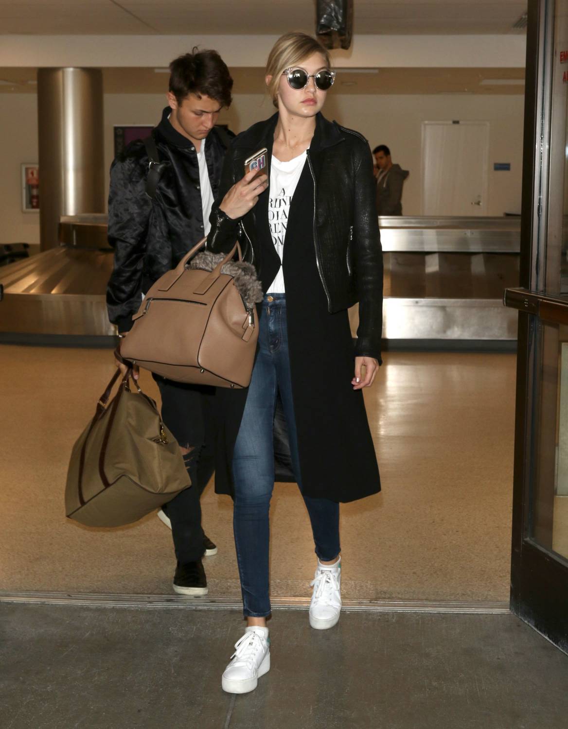 Gigi Hadid and Cody Simpson Arrive at LAX Airport - June 22