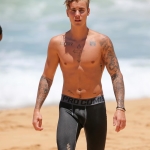 Justin Bieber Topless On The Beach of Hawaii – June 14