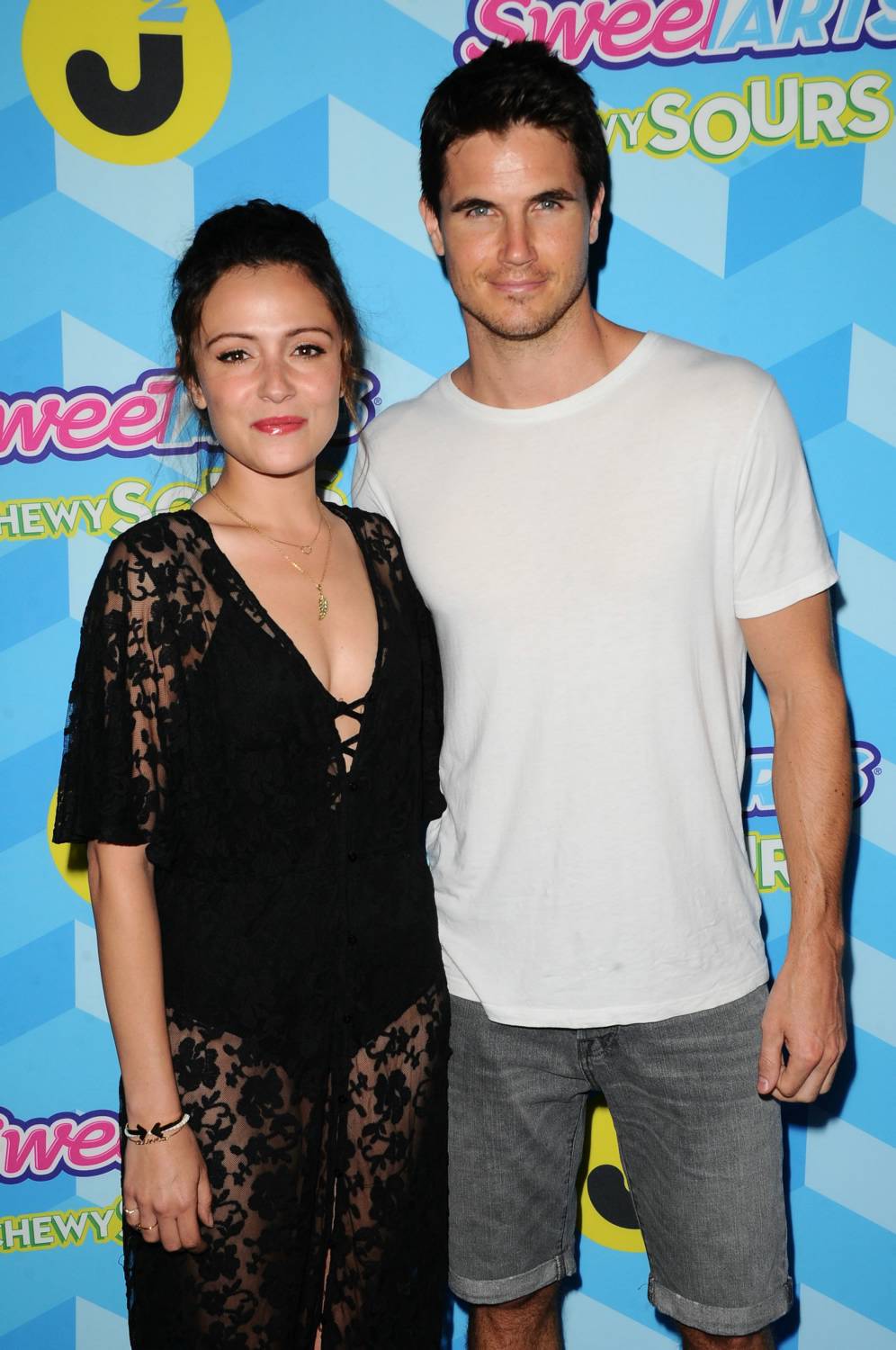 Italia Ricci and Robbie Amell at Just Jared Summer Bash Pool Party - July 18