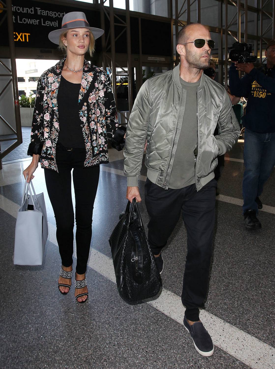 Jason Statham and Rosie Huntington-Whiteley at LAX Airport - July 24