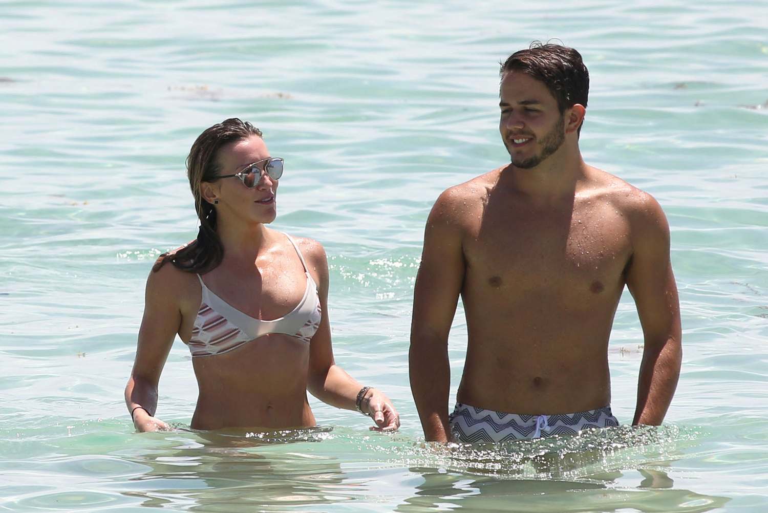 Katie Cassidy Enjoys Vacation With A Mystery Friend on Beach – August 8