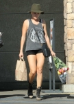 Malin Akerman In Mini Shorts With Boots As She Shops For Grocery - November 8