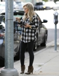 Singer and actress Hilary Duff takes her son Luca to a baby class in West Hollywood, California on December 24, 2014.
